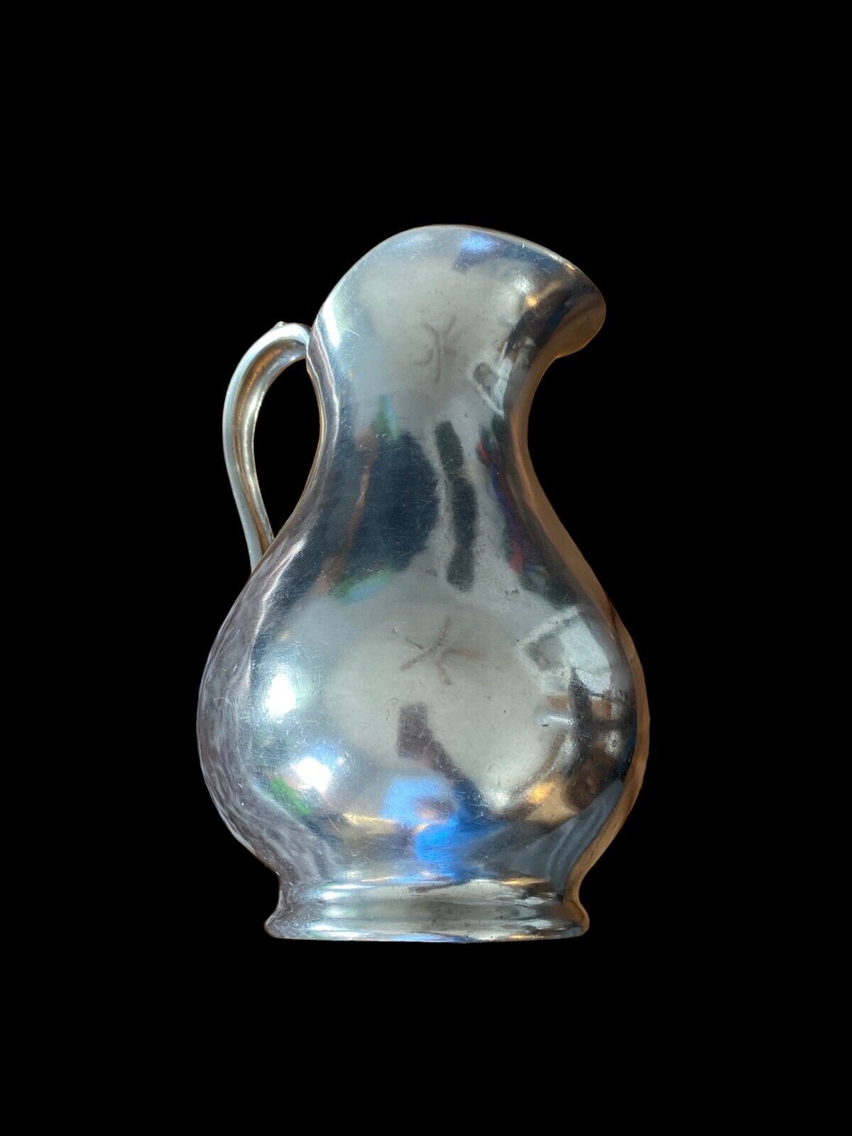 fluted pewter pitcher